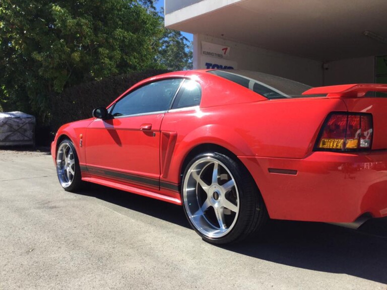 2001 Ford Mustang with staggered 20-inch Vision Jagger wheels