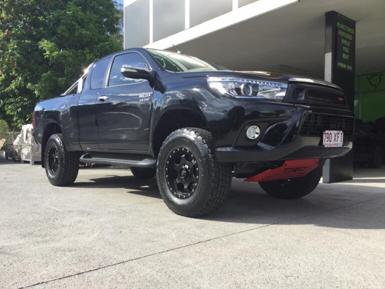 2017 Hilux with 17-inch KMC RG-1 wheels, Nitto Terra Grappler tyres, and 3-inch Bilstein suspension, diff drop mounts, adjustable upper arms