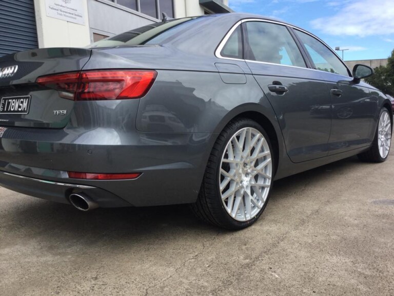 Audi A4 with 20-inch Rotiform BLQ wheels in silver with machined face