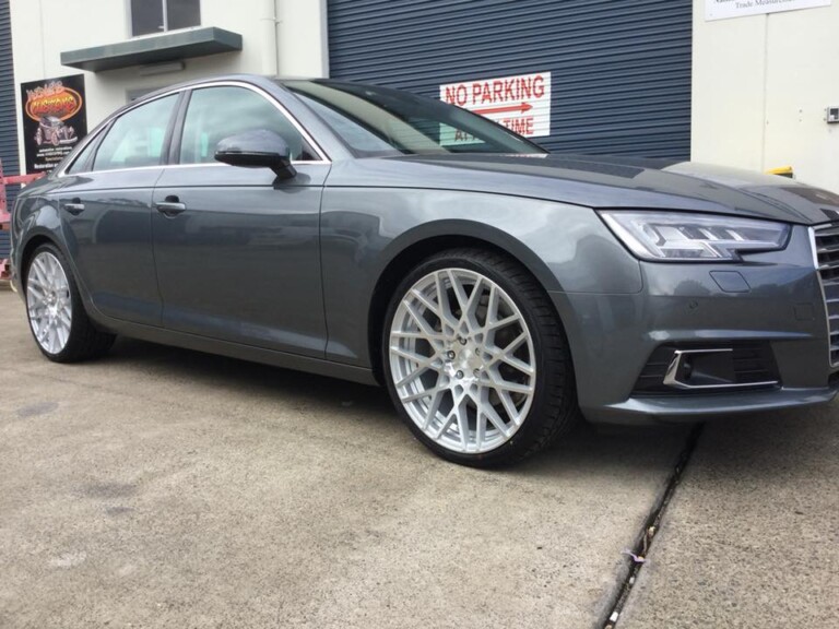 Audi A4 with 20-inch Rotiform BLQ wheels in silver with machined face