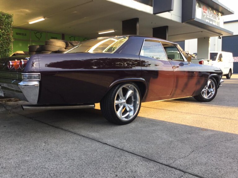 Chevy Impala with 18-inch front and 20-inch rear Boyd Coddington Junkyard Dog wheels