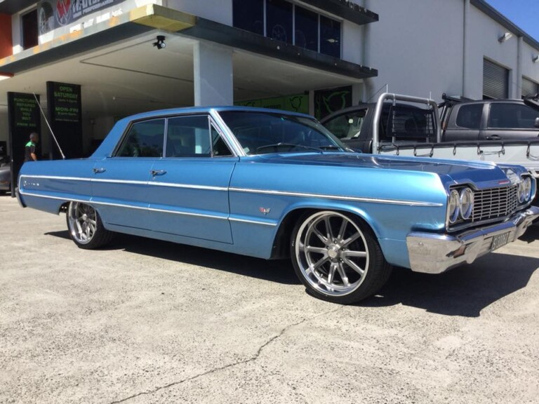 Chevy Impala with 20-inch US Rambler wheels in textured grey with polished lip