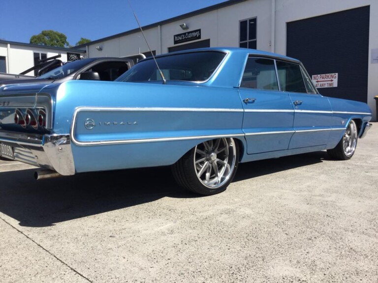 Chevy Impala with 20-inch US Rambler wheels in textured grey with polished lip