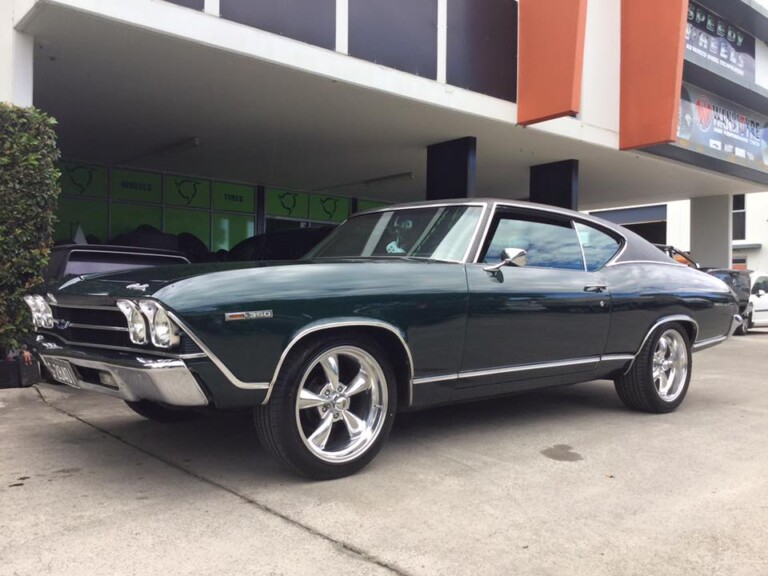 Chevy Malibu with polished 18-inch Rev Classic wheels