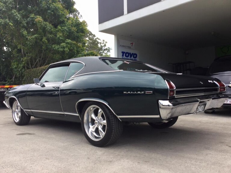 Chevy Malibu with polished 18-inch Rev Classic wheels