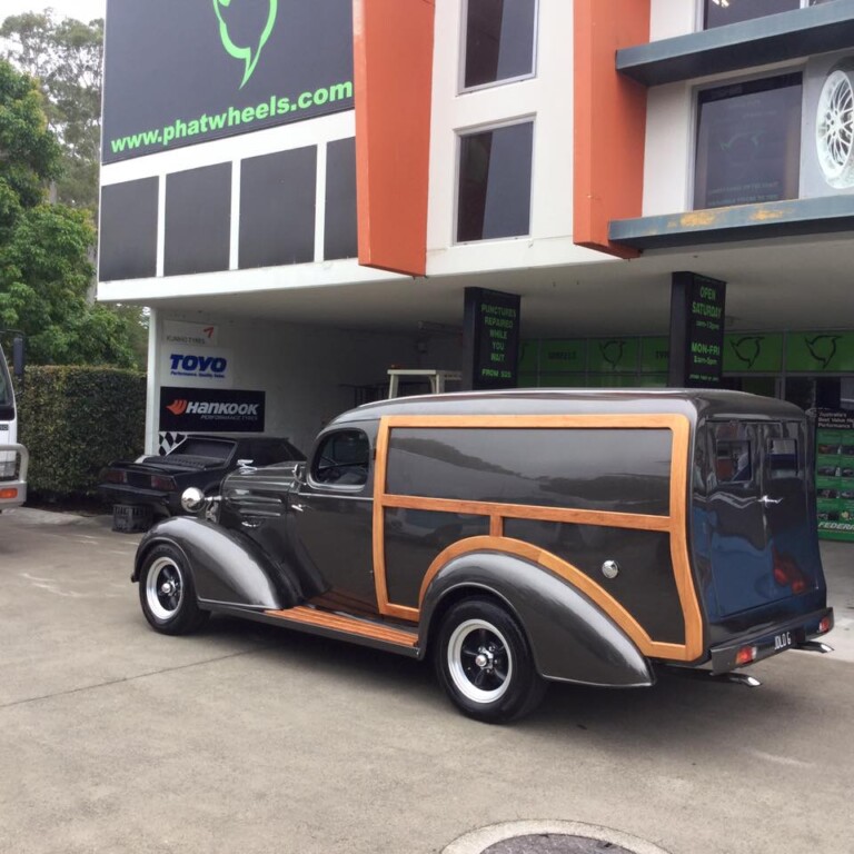 Custom Chevy-powered woody with 15-inch American Racing Torq Thrust D wheels