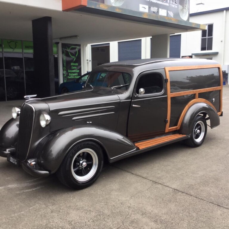 Custom Chevy-powered woody with 15-inch American Racing Torq Thrust D wheels