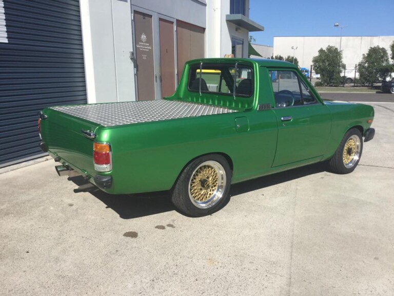 Datsun 1200 ute with staggered 15-inch OS mesh wheels