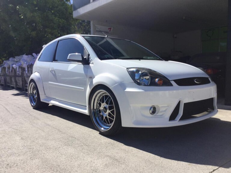 Ford Fiesta wide body with custom offset 18-inch Vision Raven wheels