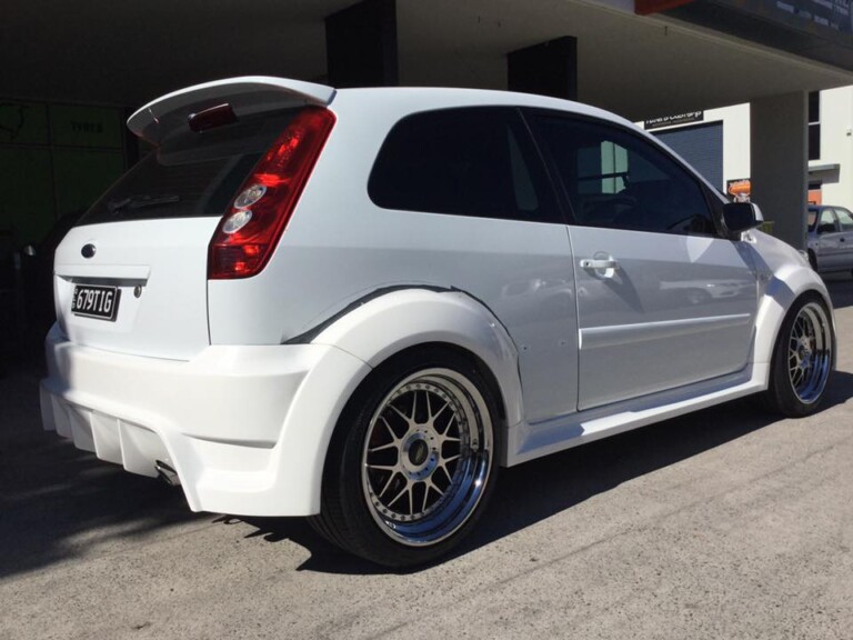 Ford Fiesta wide body with custom offset 18-inch Vision Raven wheels