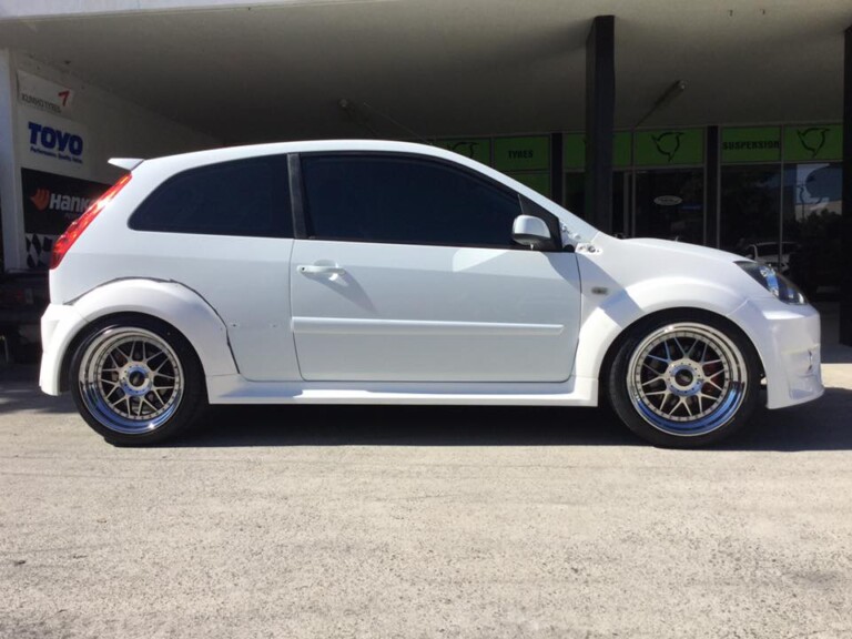 Ford Fiesta wide body with custom offset 18-inch Vision Raven wheels