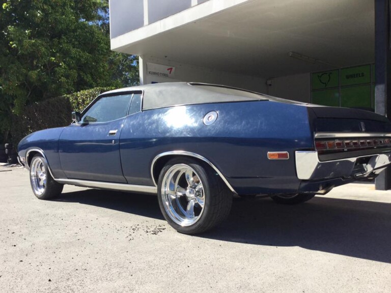 Ford Landau with custom 18-inch polished Torq Thrust wheels and Nitto Drag radial tyres