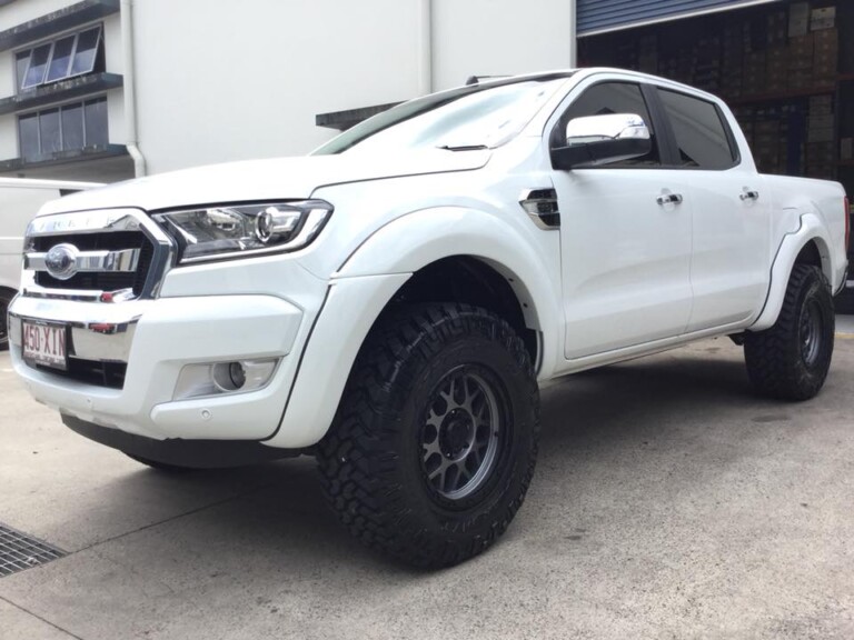 Ford Ranger with 17-inch KMC Grenade wheels in matte grey with black lip, Nitto Trail Grappler M/T tyres, flare kit and suspension lift
