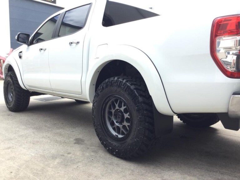 Ford Ranger with 17-inch KMC Grenade wheels in matte grey with black lip, Nitto Trail Grappler M/T tyres, flare kit and suspension lift