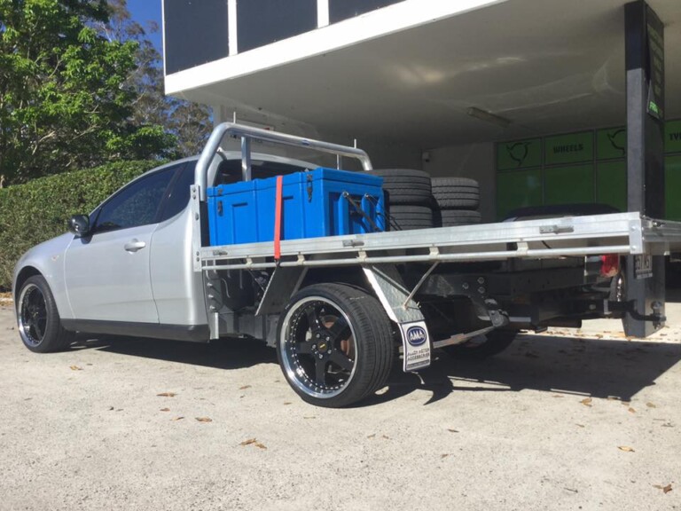 Ford ute with 20-inch staggered Simmons FR wheels in black with machined lip