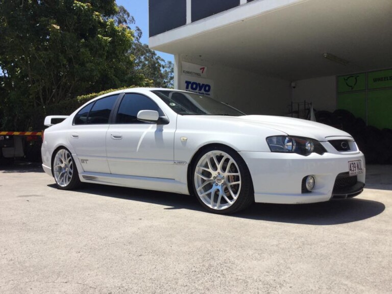 GT Falcon with 20-inch staggered SSW machined wheels in white