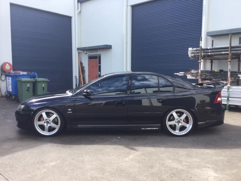 Clubsport with staggered silver 20-inch Simmons FR wheels