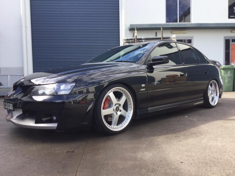 Clubsport with staggered silver 20-inch Simmons FR wheels