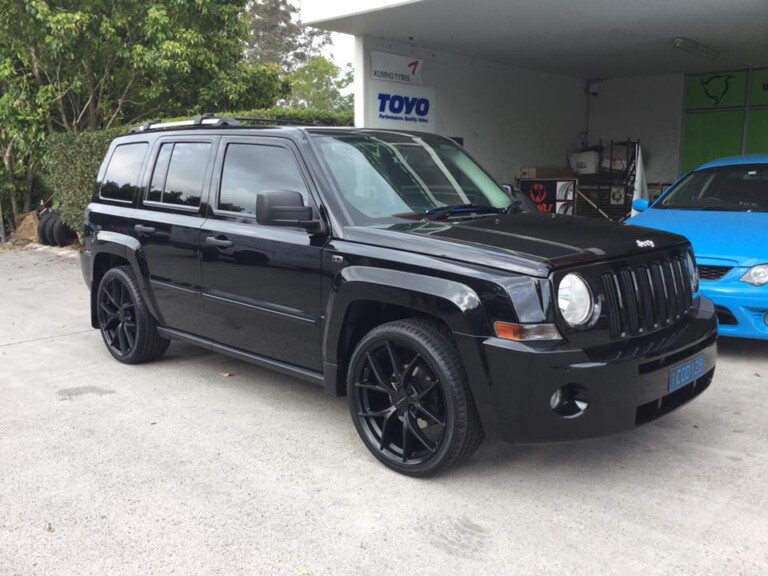 Jeep Patriot with satin black 20-inch KMC Wishbone wheels