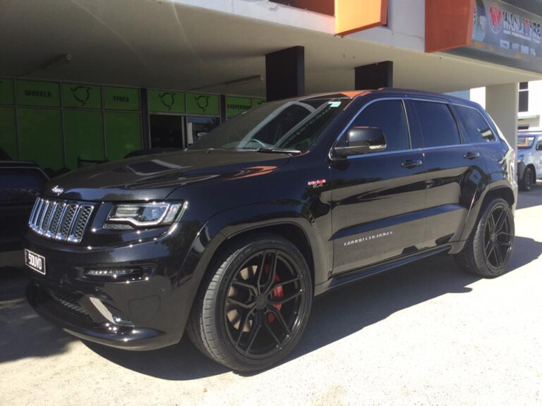 Jeep SRT with 22-inch Vertini wheels in custom black finish