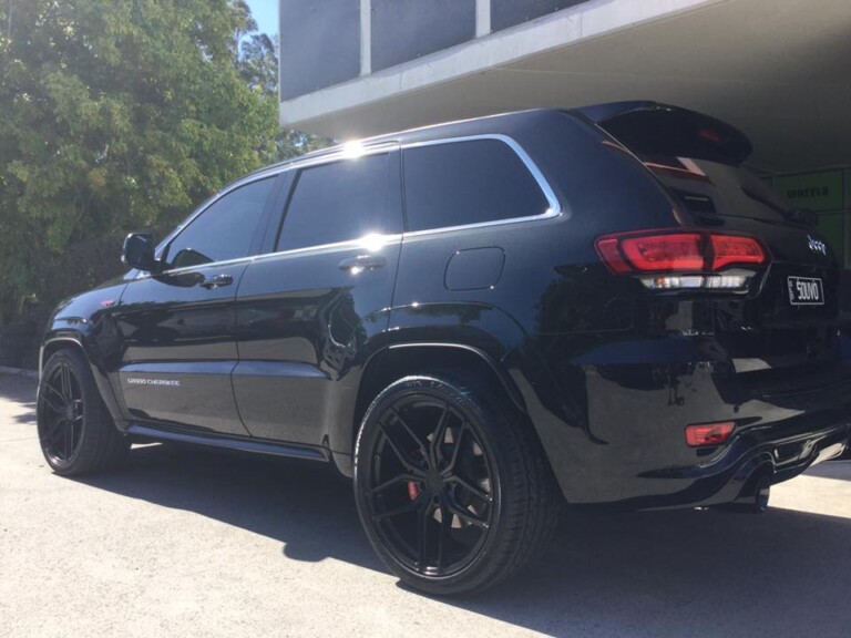 Jeep SRT with 22-inch Vertini wheels in custom black finish