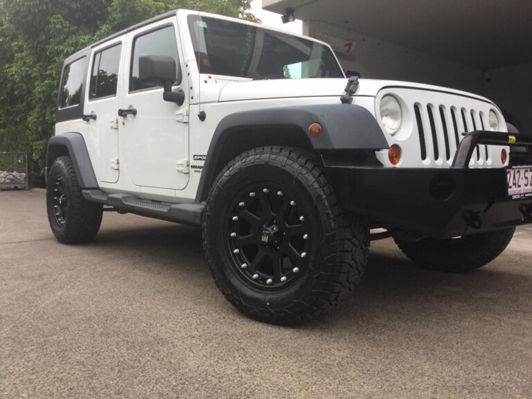 Jeep Wrangler with 18-inch XD Addict wheels and Fuel Gripper A/T tyres