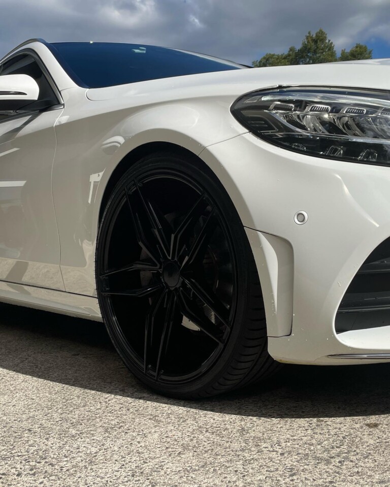 Mercedes with 20-inch OX Wheels and lowered Eibach suspension