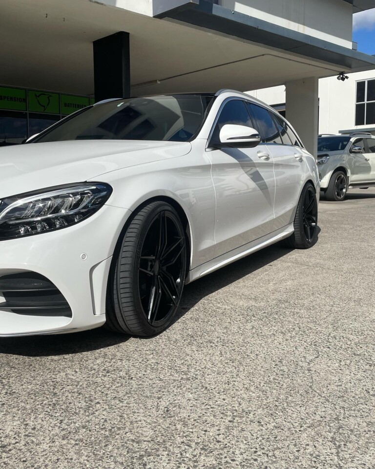 Mercedes with 20-inch OX Wheels and lowered Eibach suspension