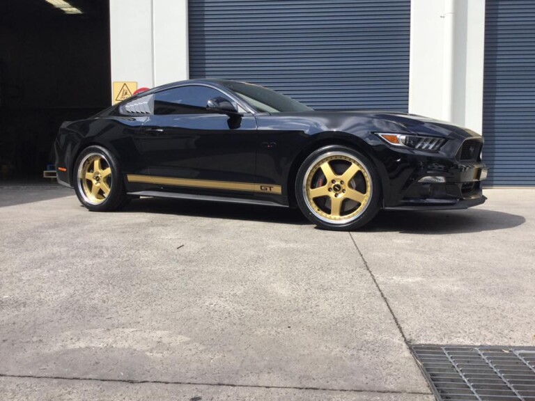 Mustang GT with 20-inch staggered Simmons FR-1 wheels and Nitto Invo tyres
