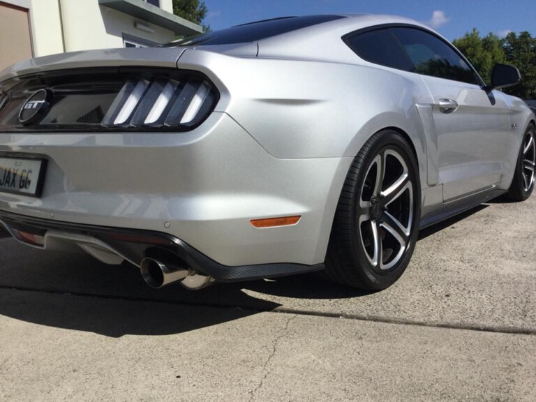 Mustang with staggered American Racing 20-inch Hot Lap wheels and Continental tyres