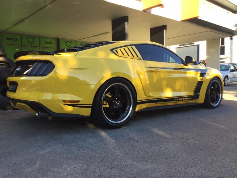 Mustang with 20-inch staggered Simmons FR-1 wheels and Nitto Invo tyres