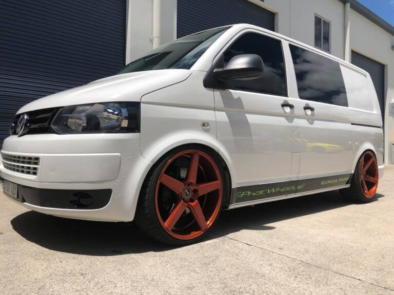Phat Wheels BiTurbo VW van with staggered 22-inch KMC District wheels in candy bronze