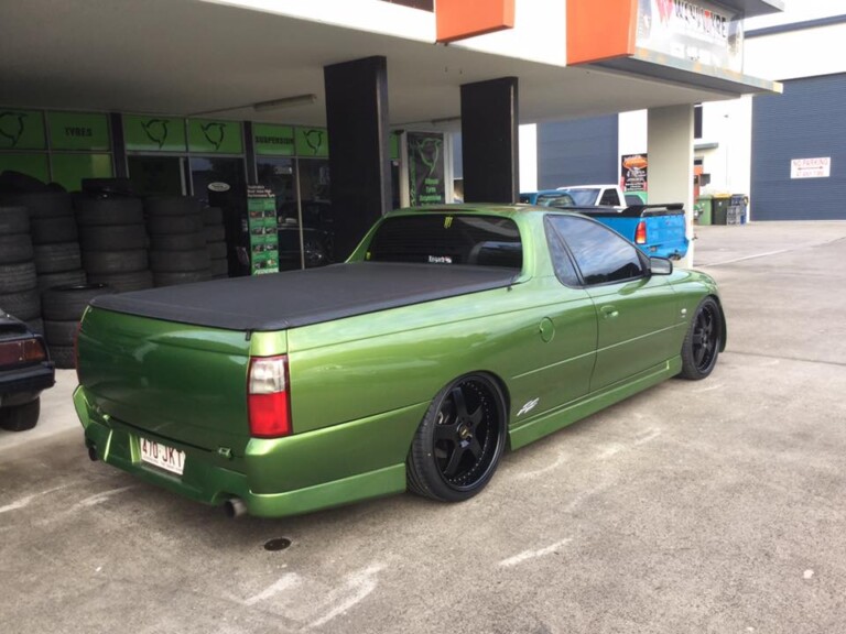 SS Commodore with staggered full black 20-inch Simmons FR wheels