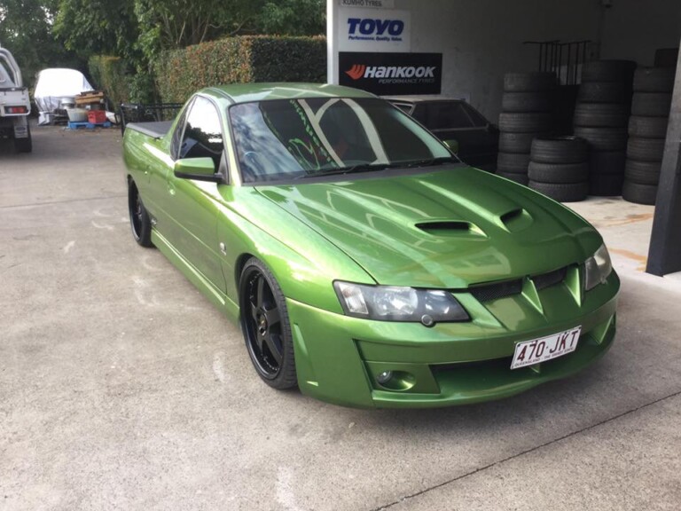 SS Commodore with staggered full black 20-inch Simmons FR wheels