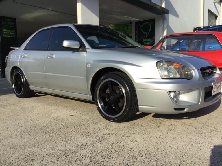 Subaru Impreza with 17-inch Hussla GT wheels in gloss black with machined lip