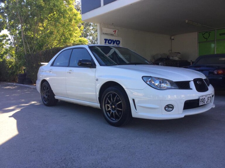 Subaru Impreza with SSW Rotate wheels in satin gunmetal