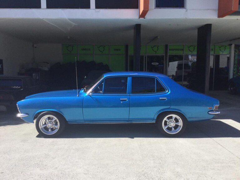 Torana with 15-inch staggered American Racing wheels in polished finish