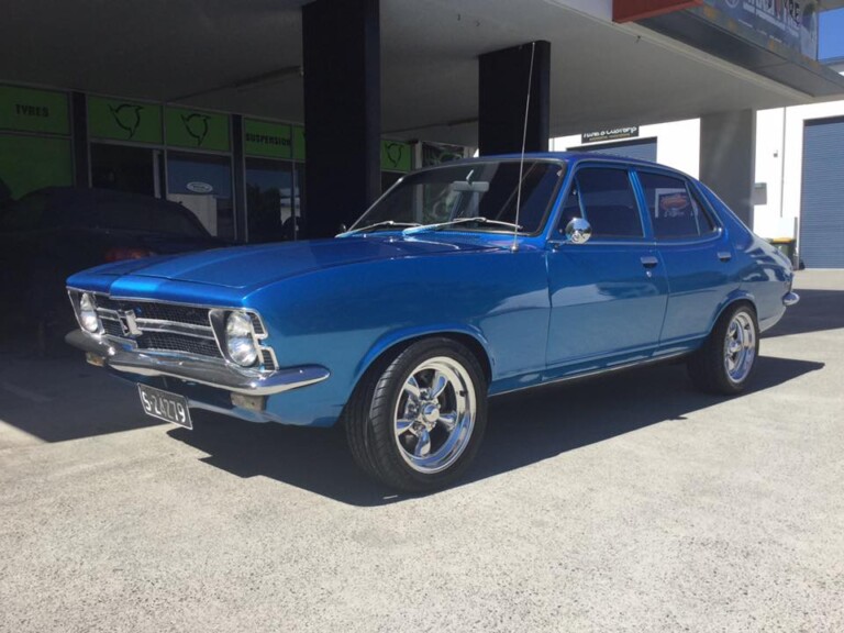 Torana with 15-inch staggered American Racing wheels in polished finish