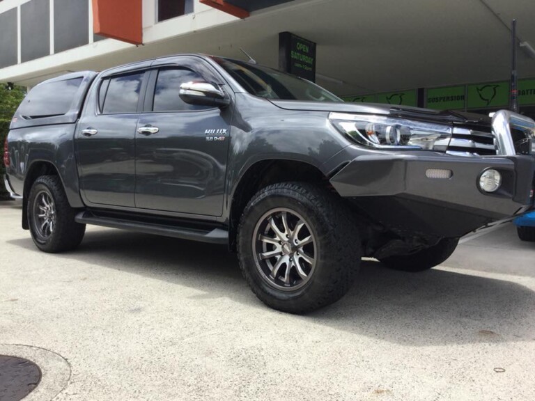 Toyota Hilux with 18-inch Moto Metal wheels in gunmetal colour and milled accents