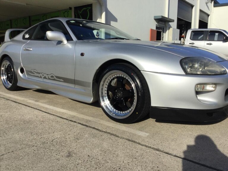 Toyota Supra with staggered 18-inch RS1 wheels in gloss black with machined lip