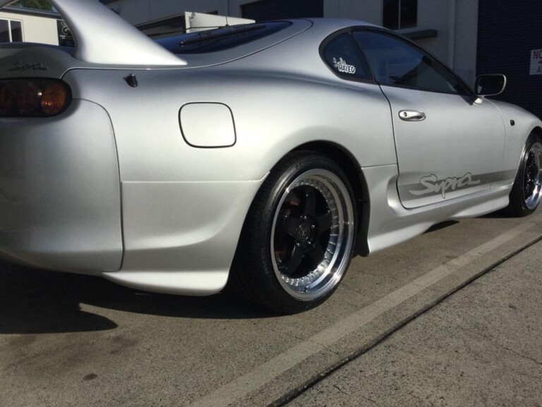 Toyota Supra with staggered 18-inch RS1 wheels in gloss black with machined lip