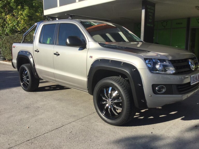 VW Amarok with 20-inch Helo wheels in gloss black with chrome attachments